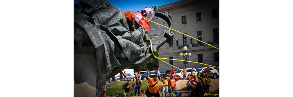Michael Yellowwing Kannon photo of the Queen Victoria Statue being toppled at the Manitoba Legislative Building on July 1, 2021.